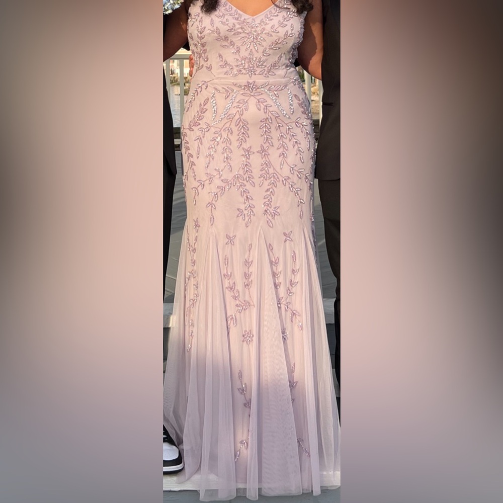 A light lavender, maxi dress by the brand Marina. In perfect condition.